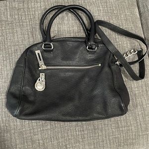 Michael Kors black leather crossbody bag with removable strap.